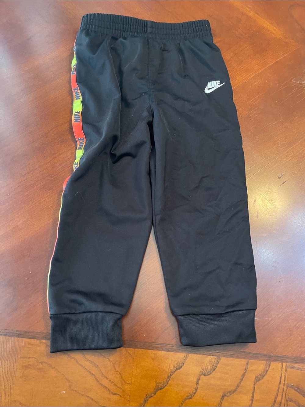 Nike Black Kids Sweatpants with Multicolor Side Stripe
